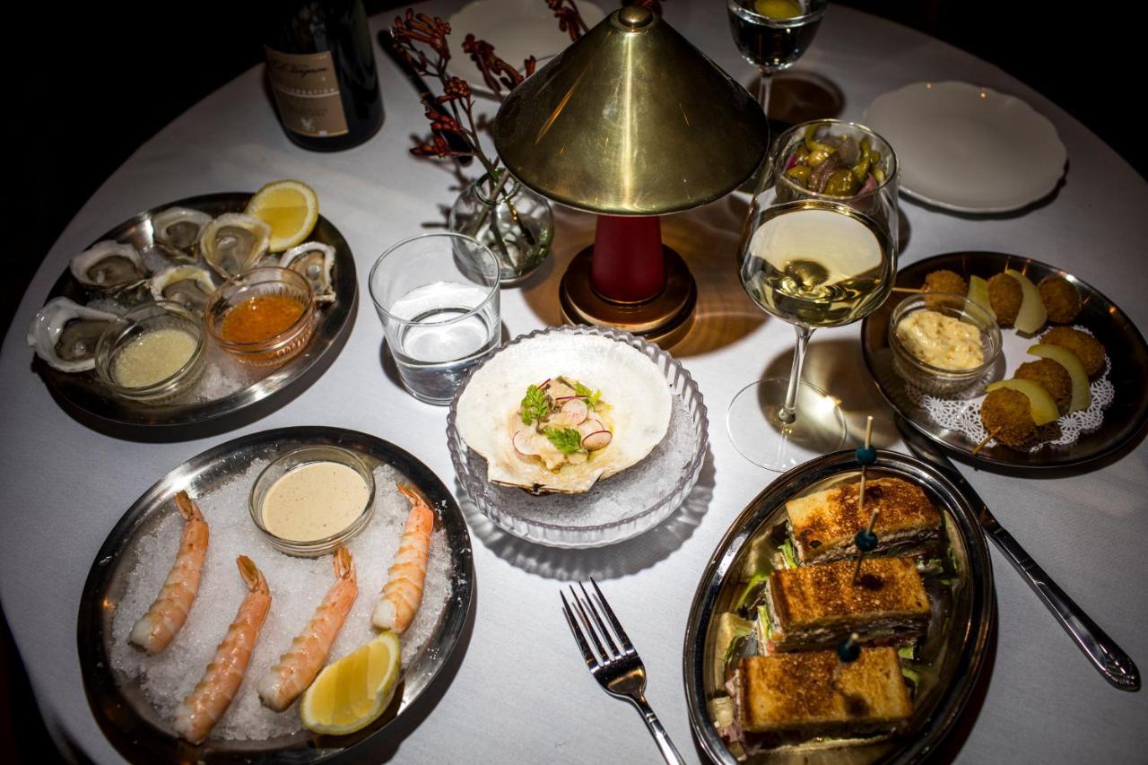 Hotel The Evelyn Nomad New York Esterno foto A selection of dishes at the restaurant