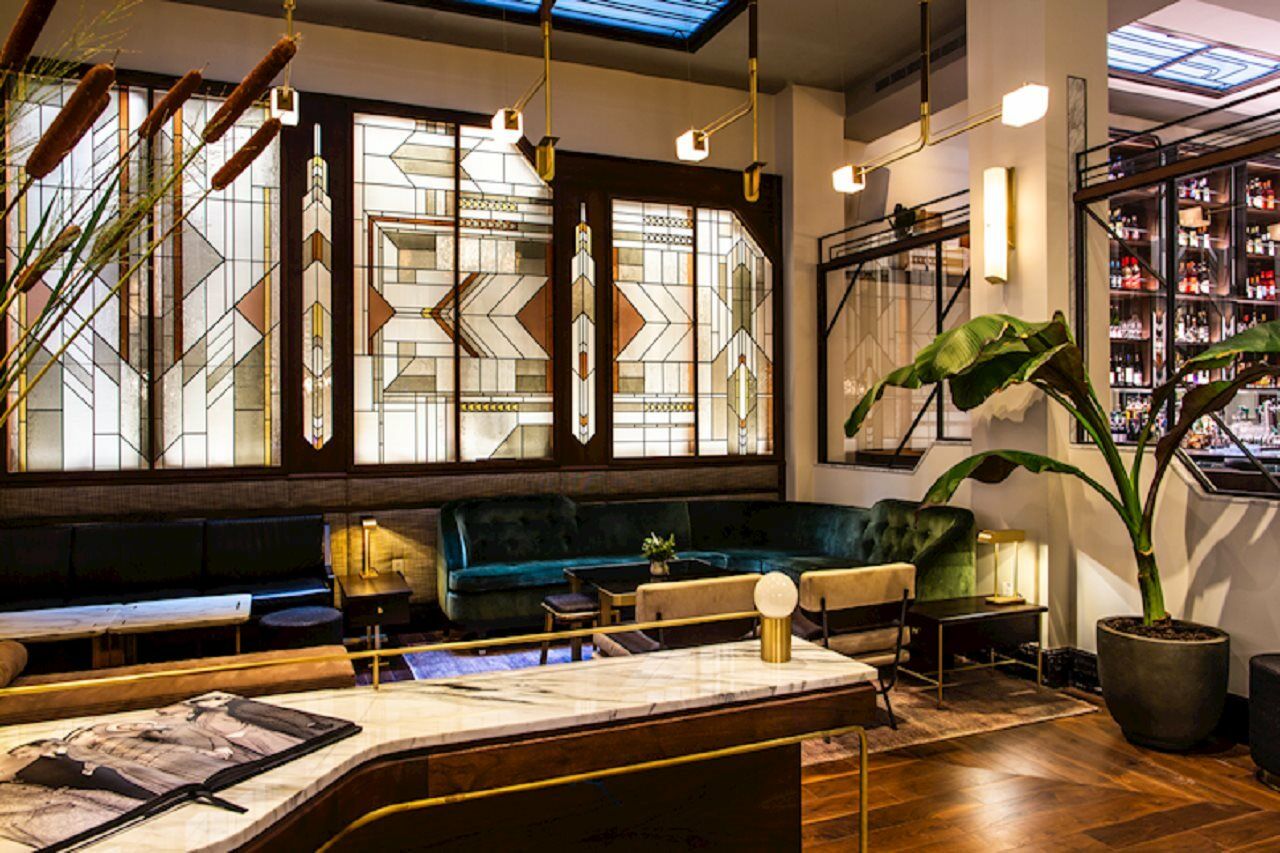 Hotel The Evelyn Nomad New York Esterno foto The interior of the restaurant
